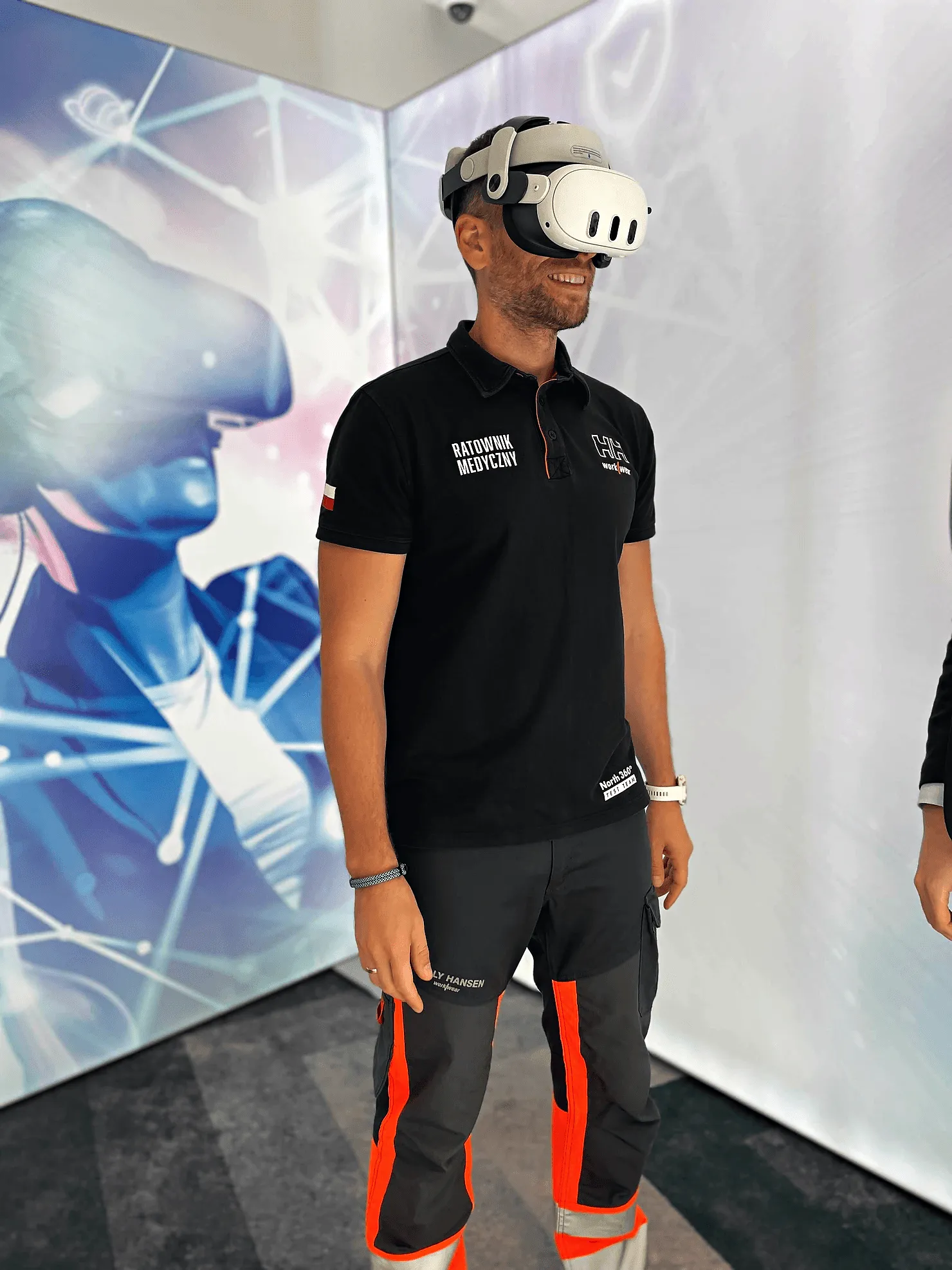 A man wearing a VR headset at an EHS VR stand