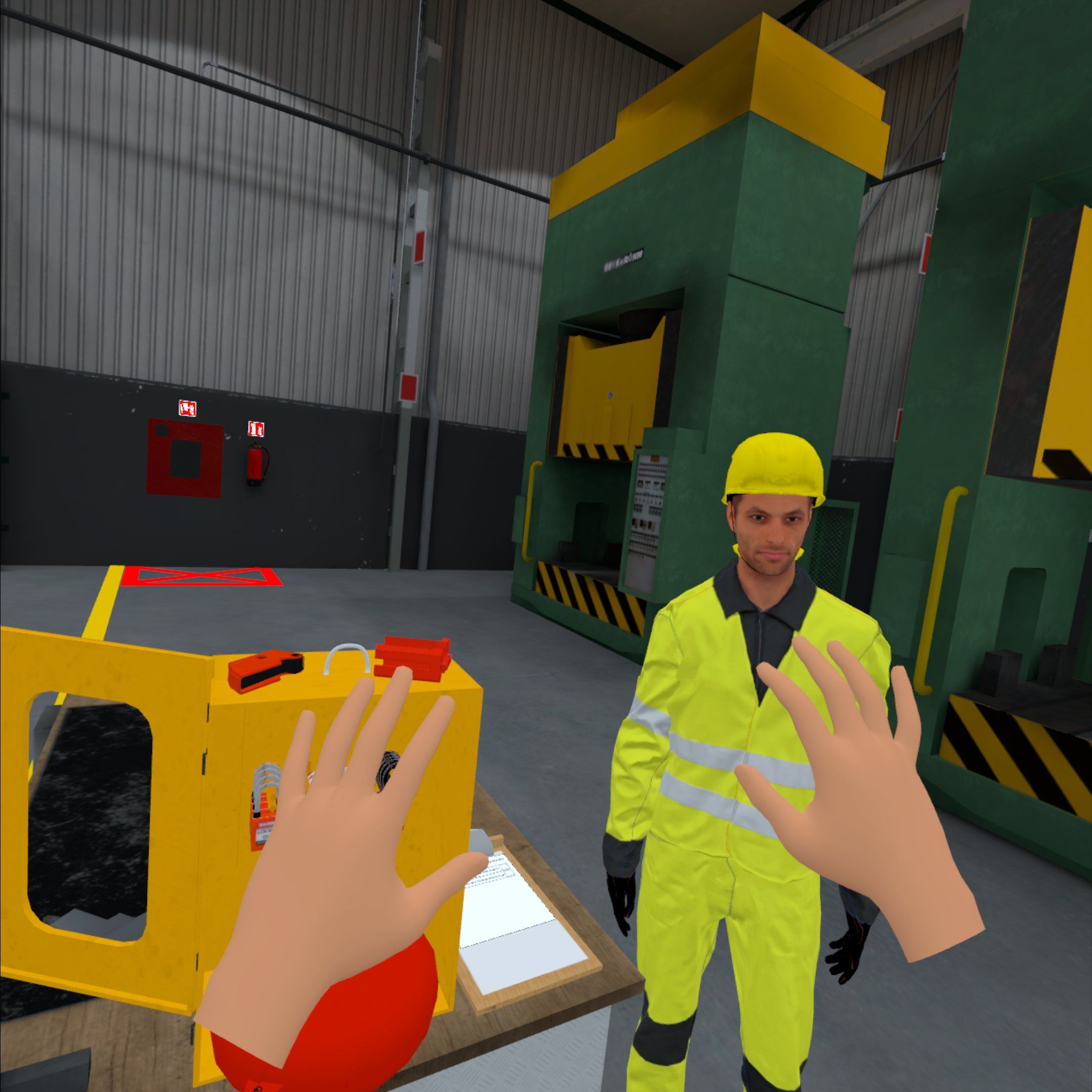 In-headset view from the Lockout/Tagout VR training: the trainee’s hands, a lockout station and a co-worker by an industrial press