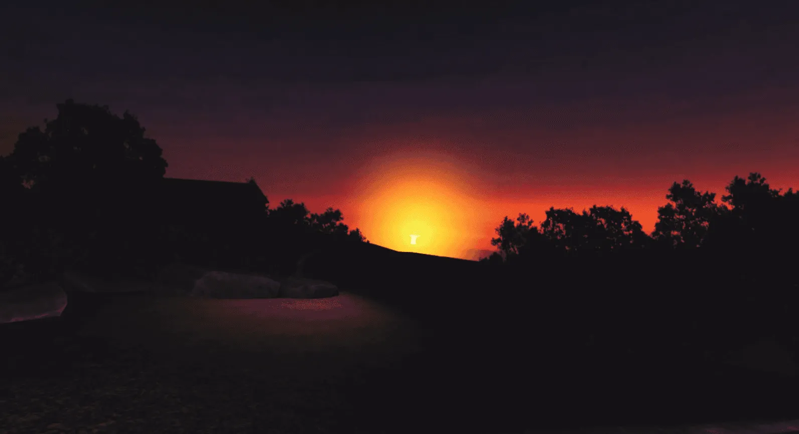 Bright glow on the horizon at night in the NRC threats VR lesson.